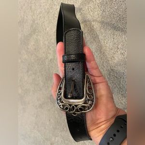 Women’s silver toned buckle black belt